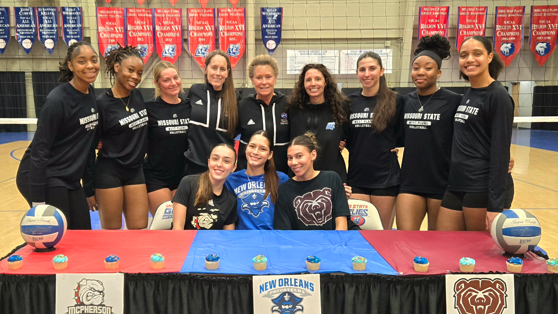 The Grizzly Volleyball team celebrates Isabella Calle, Mariana Franco and Vicky Antia after signing with their new teams (MSU-WP Photo)